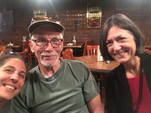 rom left: Ed Easley Poses with his lead NCIP attorney Paige Kaneb, and NCIP Legal Director Linda Starr.