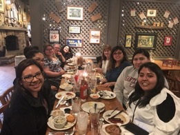 Santa Clara Law students enjoying dinner after a long day at the Florence Project.