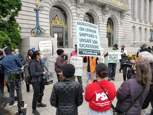 April 2021 People's Earth Day Rally at San Francisco City Hall, featuring a poster with red and black text designed by ESS major Declan Bernal '22. Credit: Declan Bernal