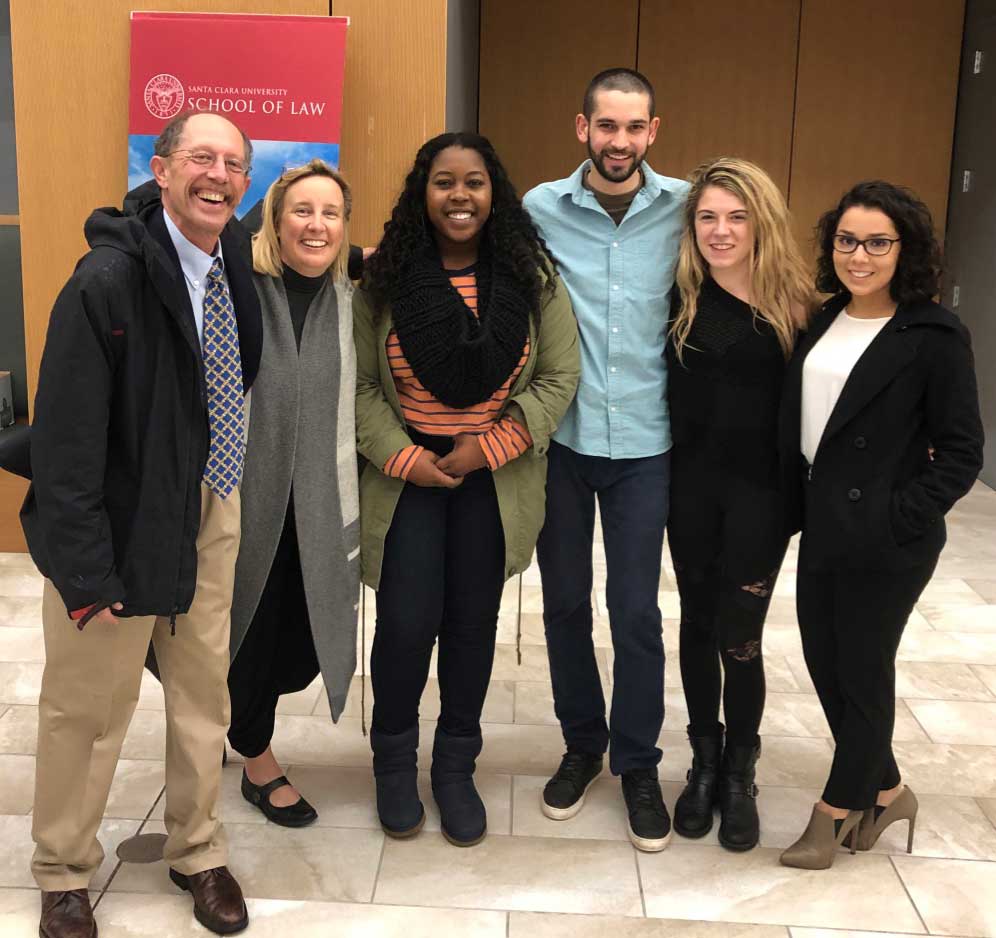 Seth Flagsberg (left) with students in his Professional Responsibility class.